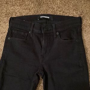 EXPRESS. BLACK STRETCH LEGGING. MID-RISE. SIZE 0.  NWOT